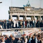 5df229da55c72_West_and_East_Germans_at_the_Brandenburg_Gate_in_1989